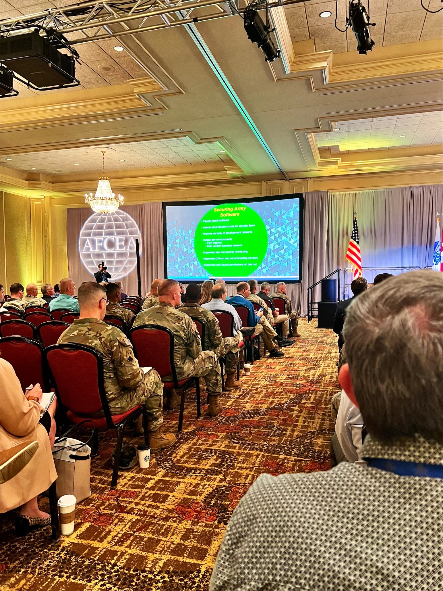 Military men in uniform in the audience